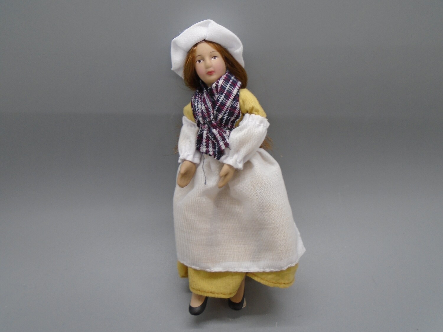 LADY WITH SCARF AND BONNET