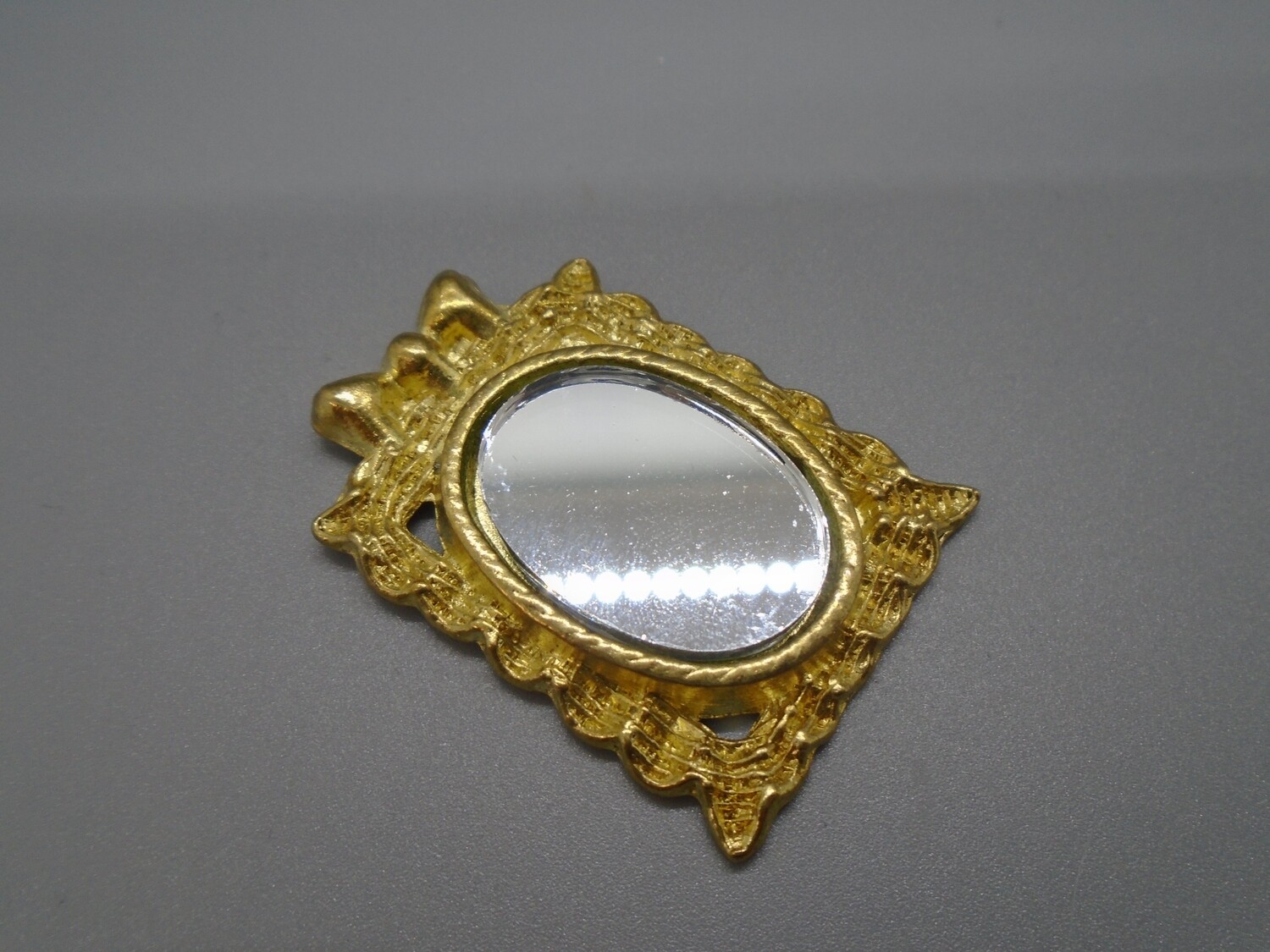 SMALL GOLD WALL MIRROR