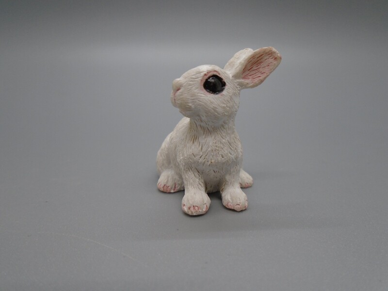 WHITE RABBIT SITTING