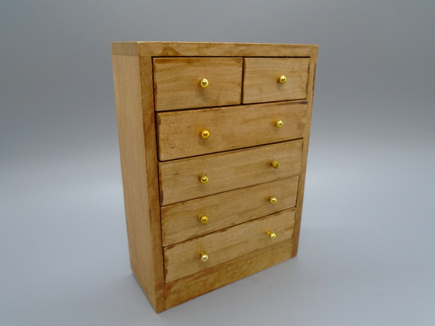 TALL STAINED CHEST WITH GOLD HANDLES
