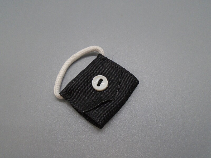 BLACK BAG WITH BUTTON