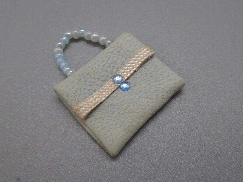 PALE BLUE PEARLY HANDBAG