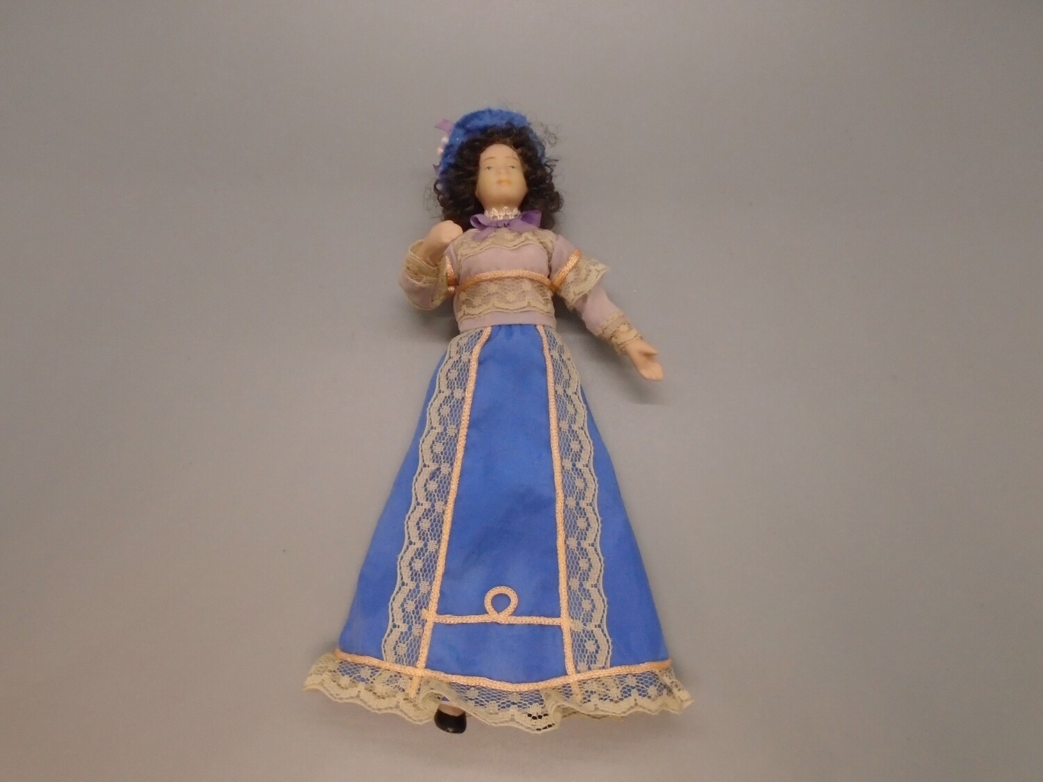 LADY IN BLUE SKIRT