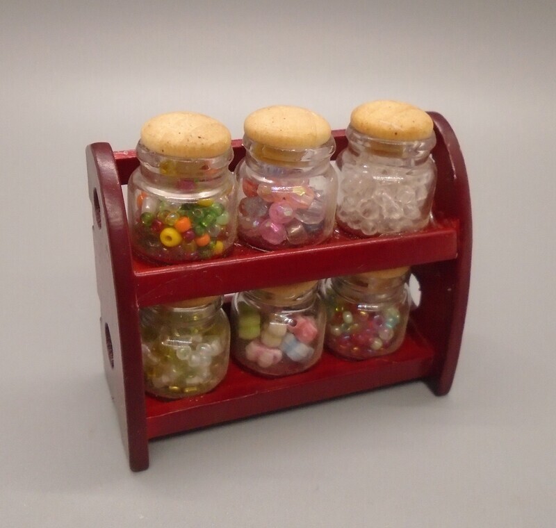 SHELF WITH CRAFT STUFF IN JARS
