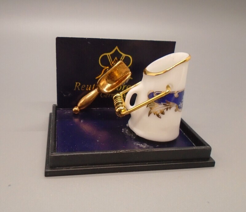 REUTTER PORCELAIN SCUTTLE SET