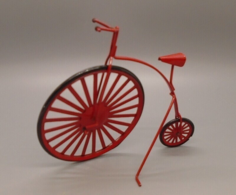 RED PENNY FARTHING BICYLE