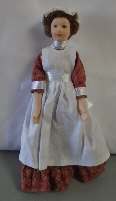 MAID IN RUST FLORAL DRESS