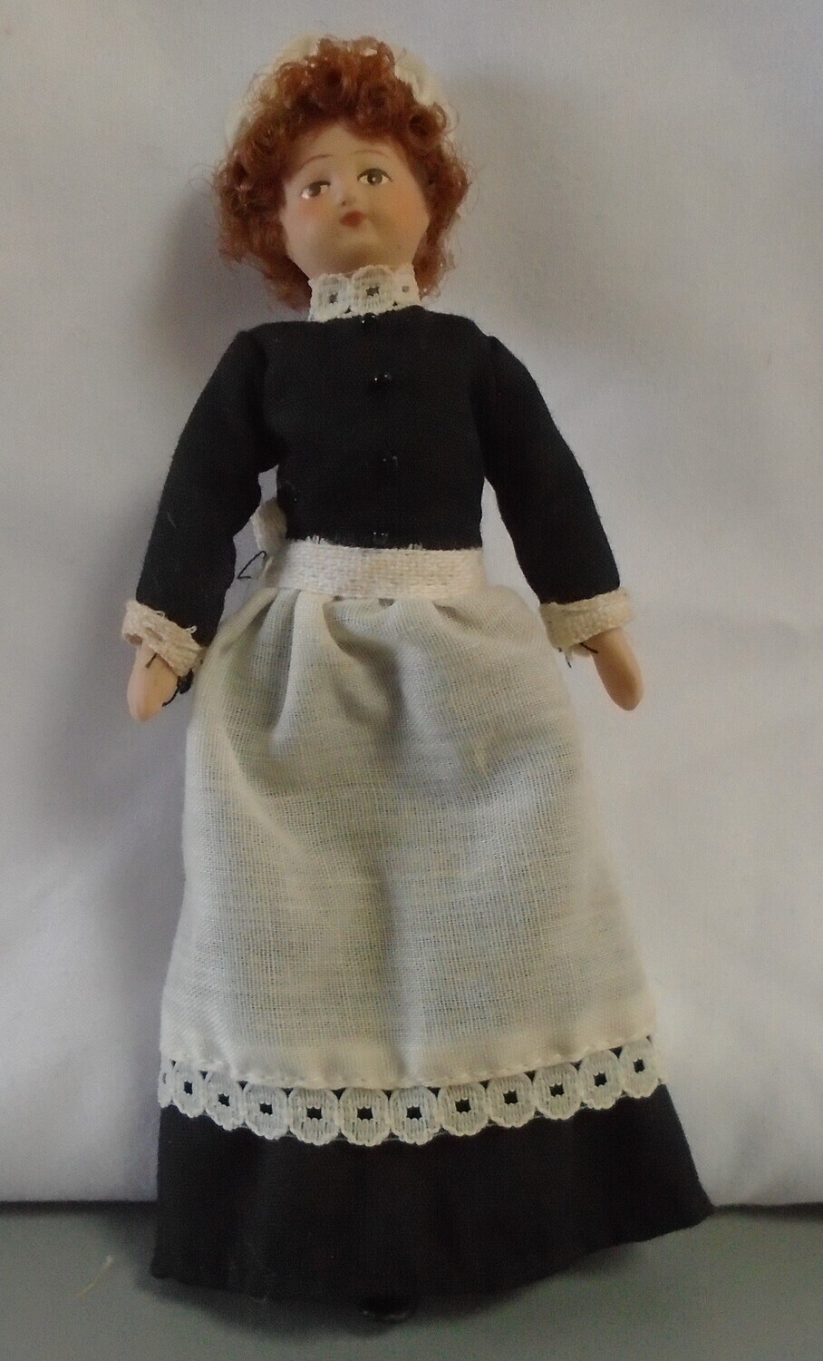 MAID/COOK WITH RED HAIR