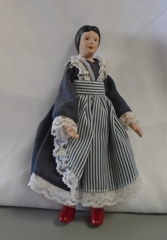 LADY IN NAVY AND STRIPE APRON