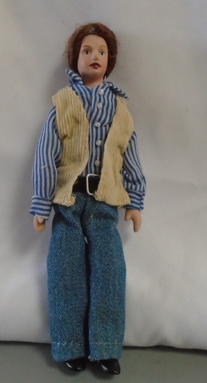 MAN WITH JEANS AND CORD WAISTCOAT