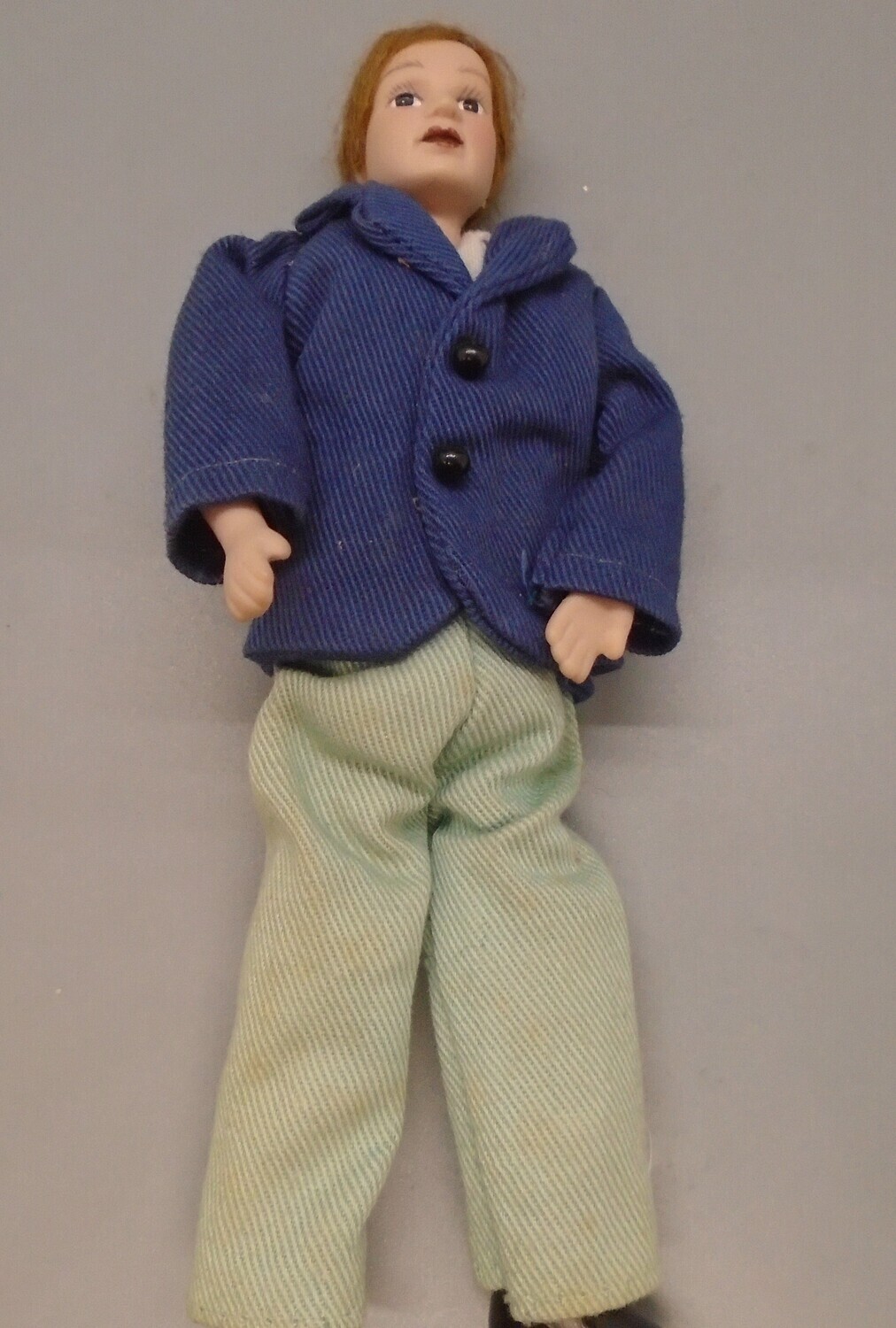 MAN IN BLUE JACKET