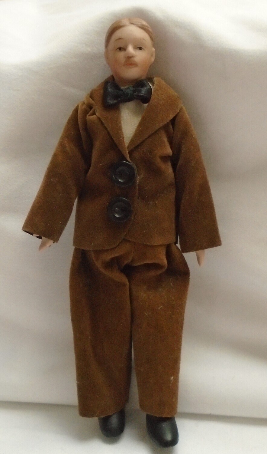 MAN IN BROWN SUIT