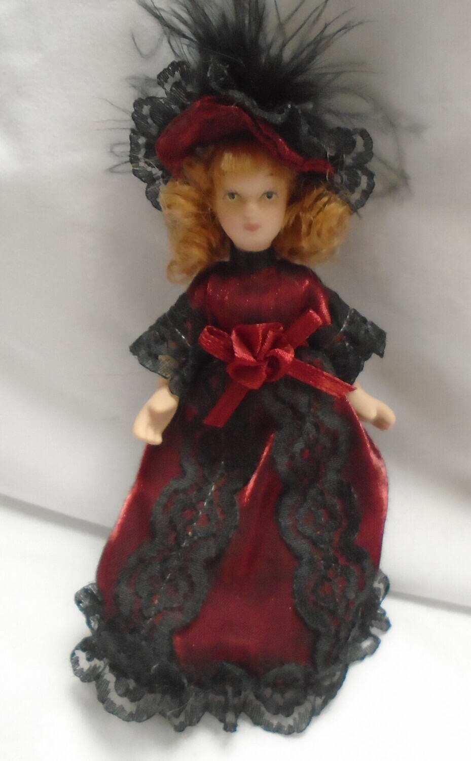 YOUNG GIRL IN RED AND BLACK
