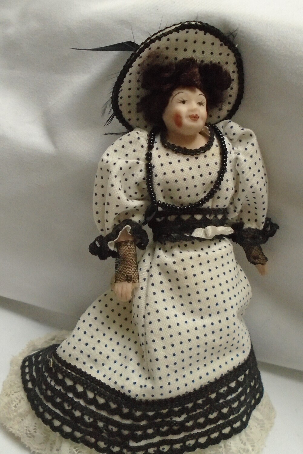 VINTAGE LADY IN BLACK AND WHITE POLKA DOT OUTFIT