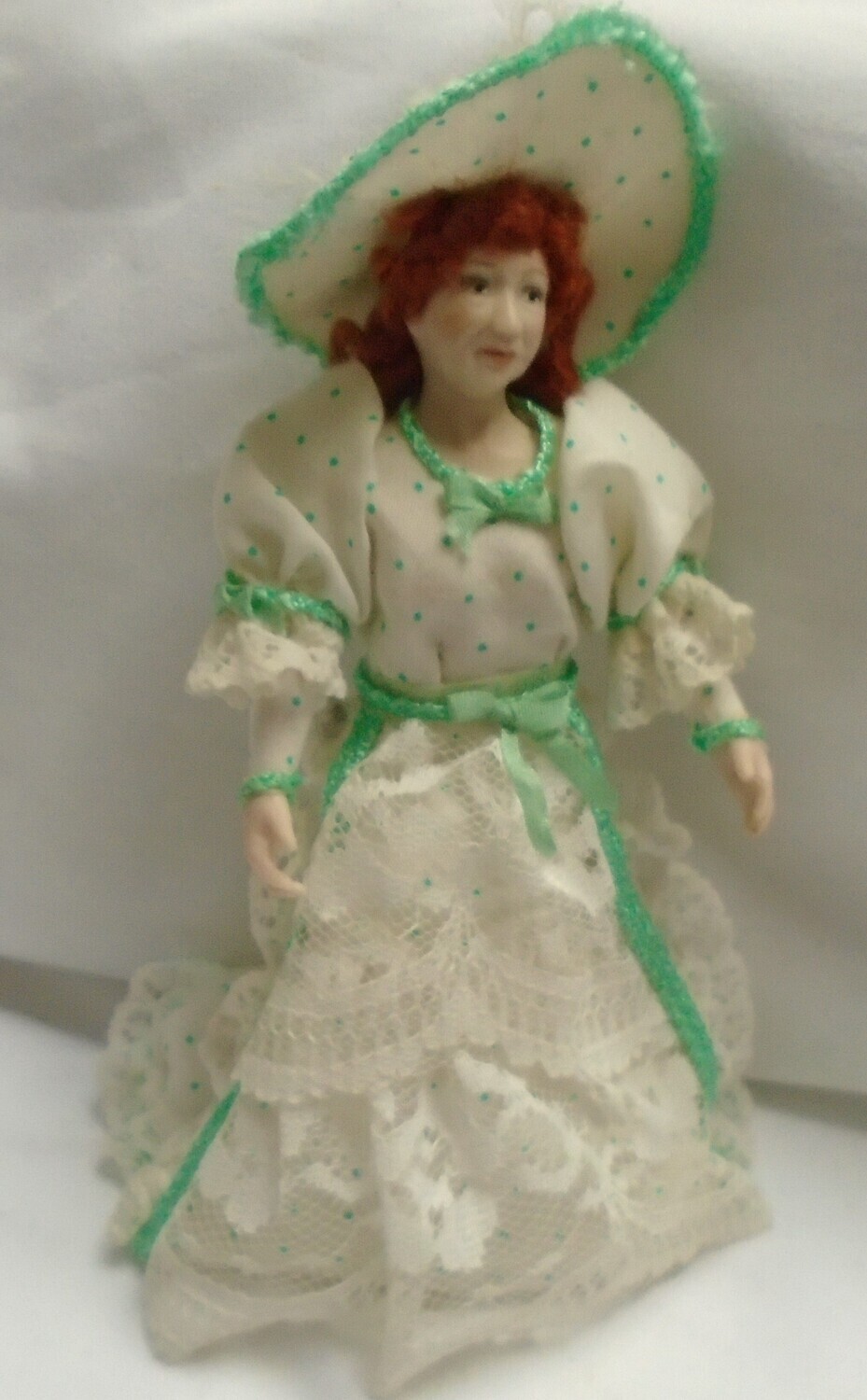 VINTAGE LADY IN GREEN SPOTTY OUTFIT
