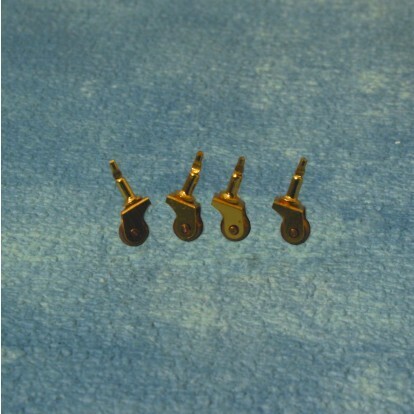 4 BRASS CASTORS