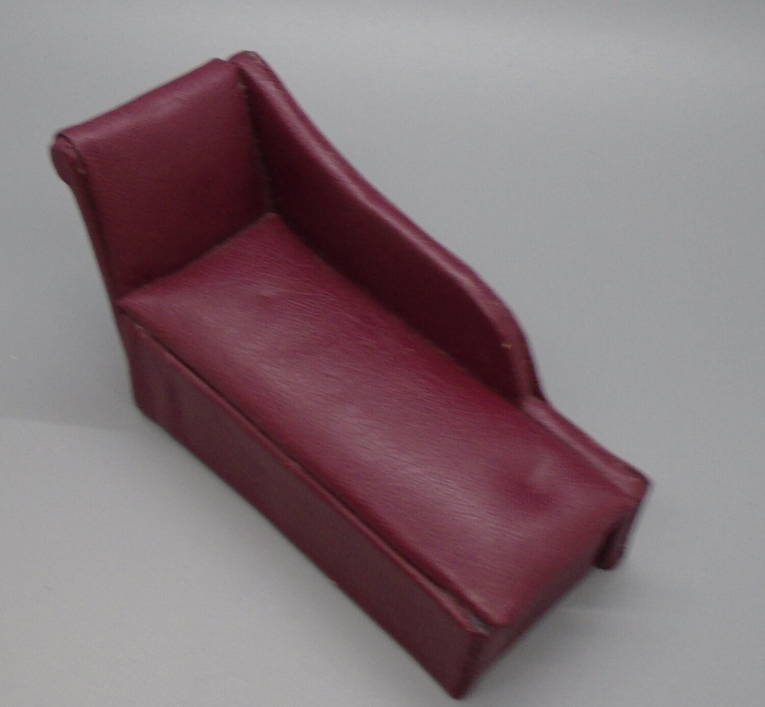 MODERN STYLE LEATHER CHAISE IN BURGUNDY RED