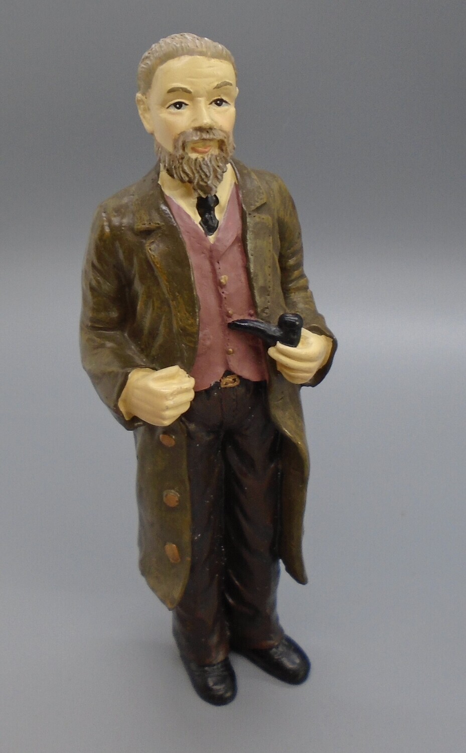 MAN WITH BROWN COAT AND PIPE