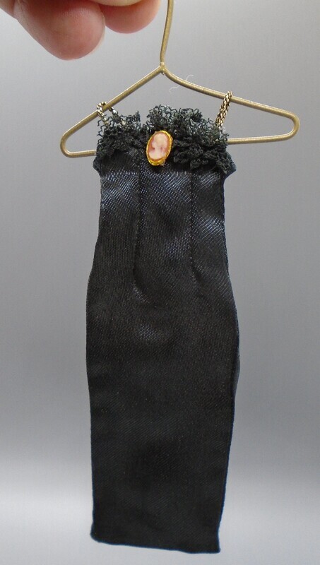 BLACK DRESS  WITH CAMEO ON HANGER