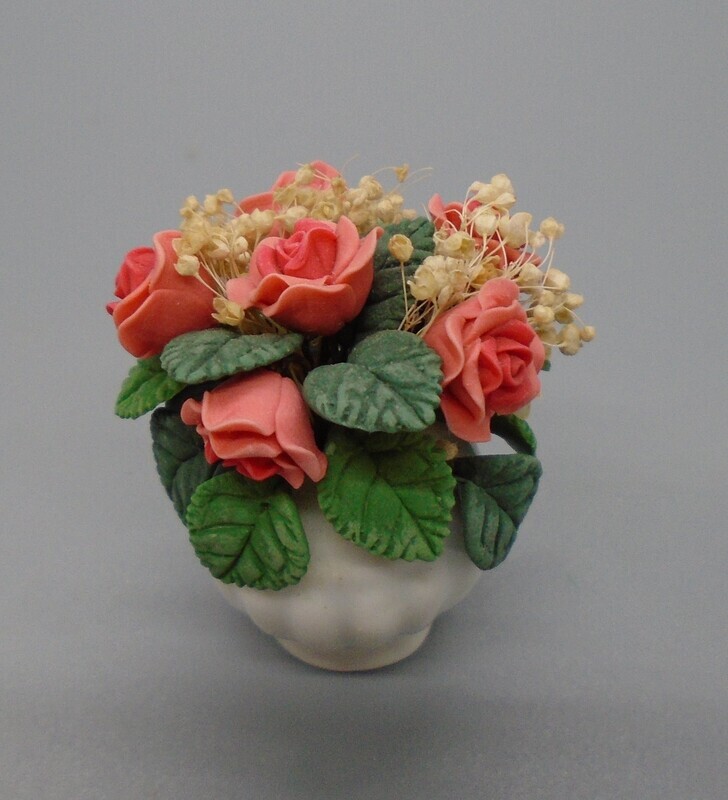 FLOWERS IN WHITE VASE