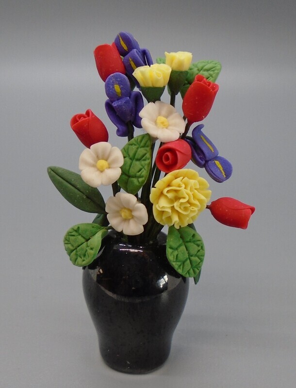 FLOWERS IN BLACK VASE