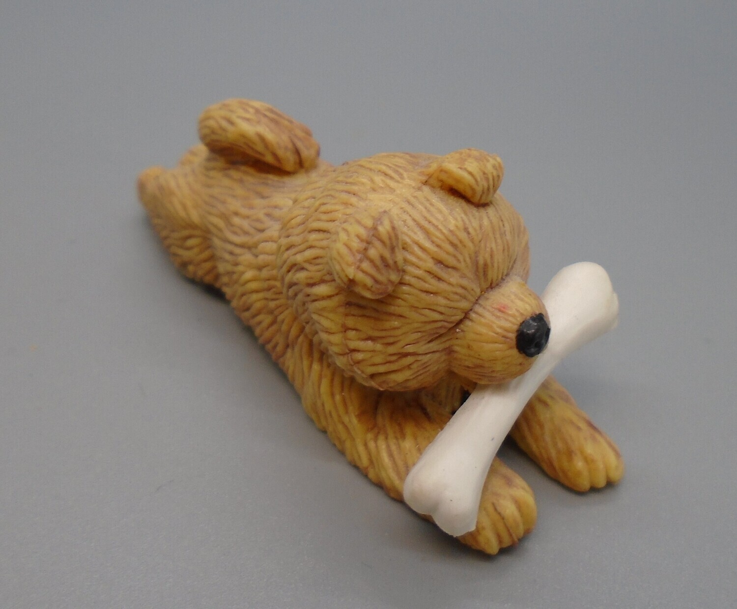 DOG WITH A BONE