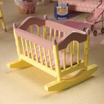 CREAM AND PINK CRADLE WITH MATTRESS