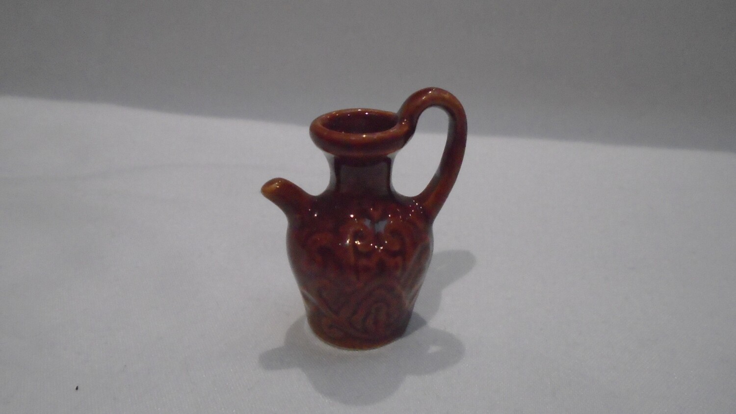 EARTHEN GLAZED JUG