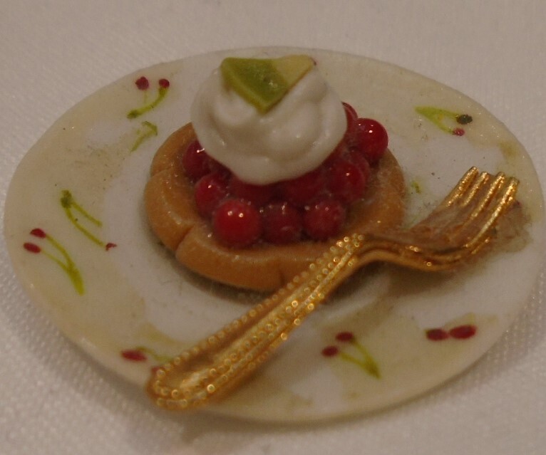 FRUIT TART WITH CREAM ON PLATE