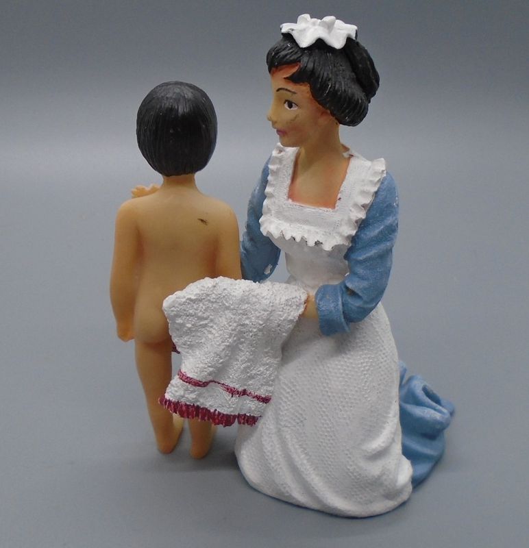 MAID DRYING A CHILD