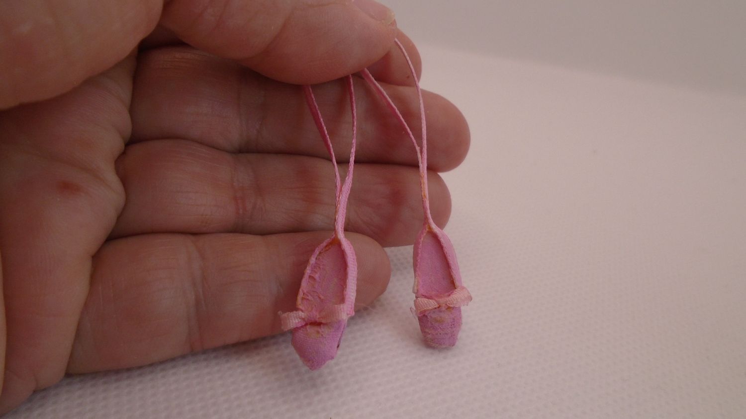 PAIR OF WORN BALLET SHOES PAIR OF WORN BALLET SHOES