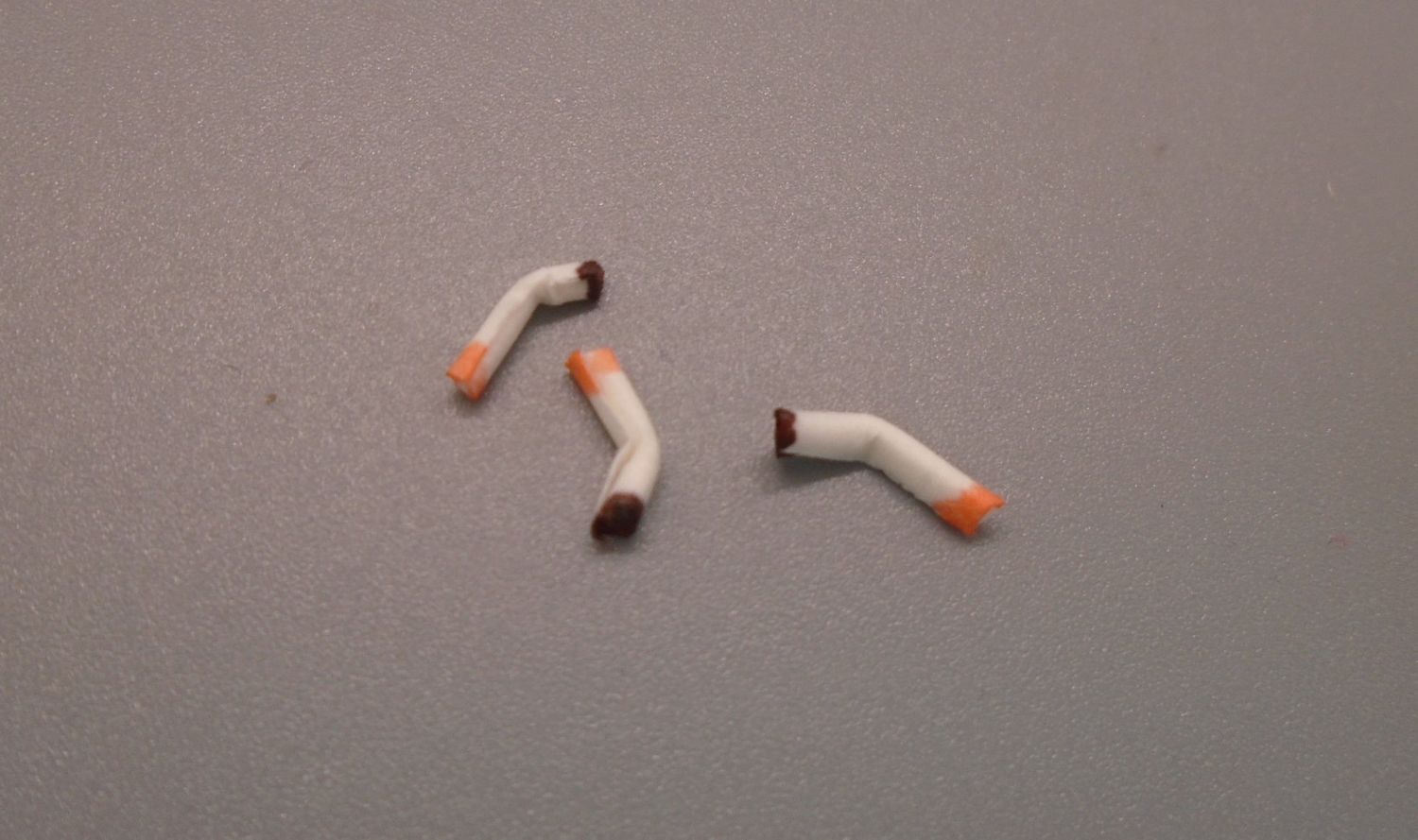 3 CIGARETTE BUTTS