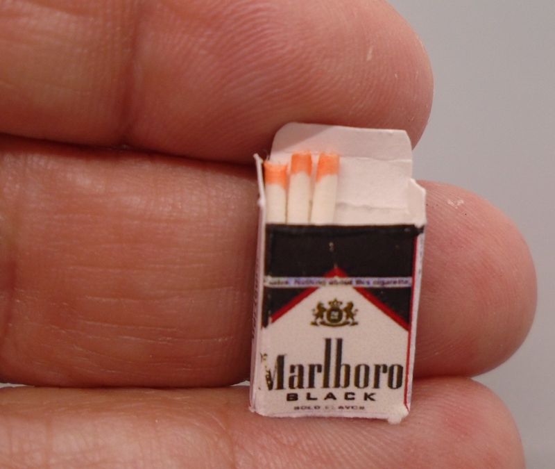 OPEN PACKET OF CIGARETTES