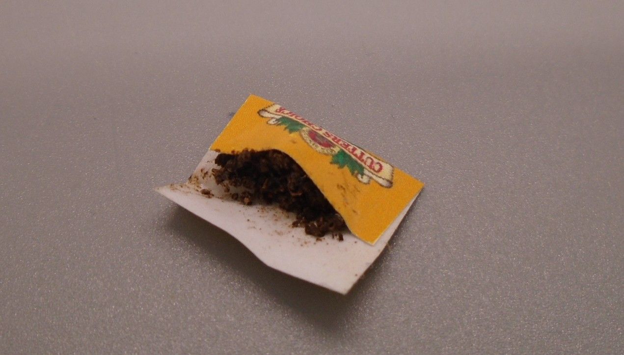 OPEN POUCH OF TOBACCO