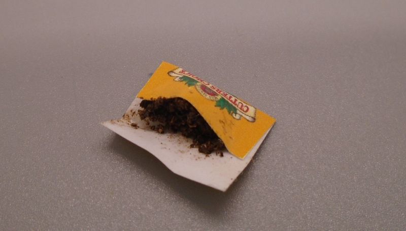 OPEN POUCH OF TOBACCO