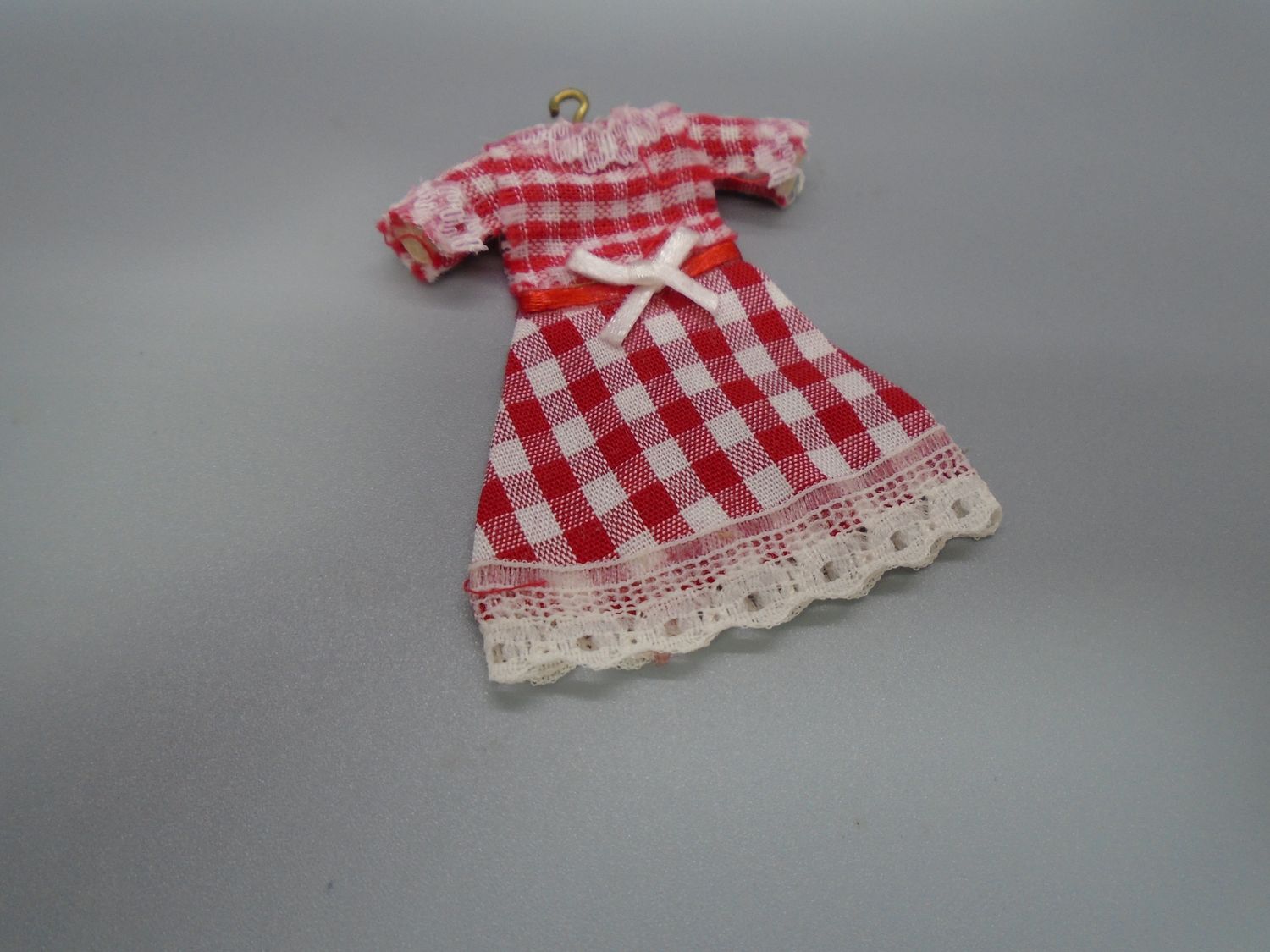 CHILDS DRESS ON WOODEN HANGER CHILDS DRESS ON WOODEN HANGER