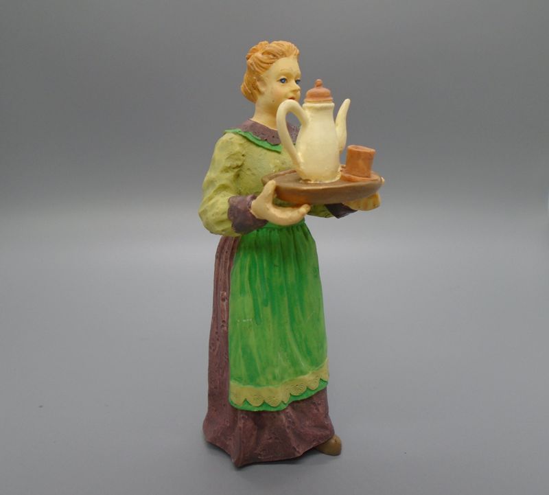 LADY CARRYING COFFEE TRAY