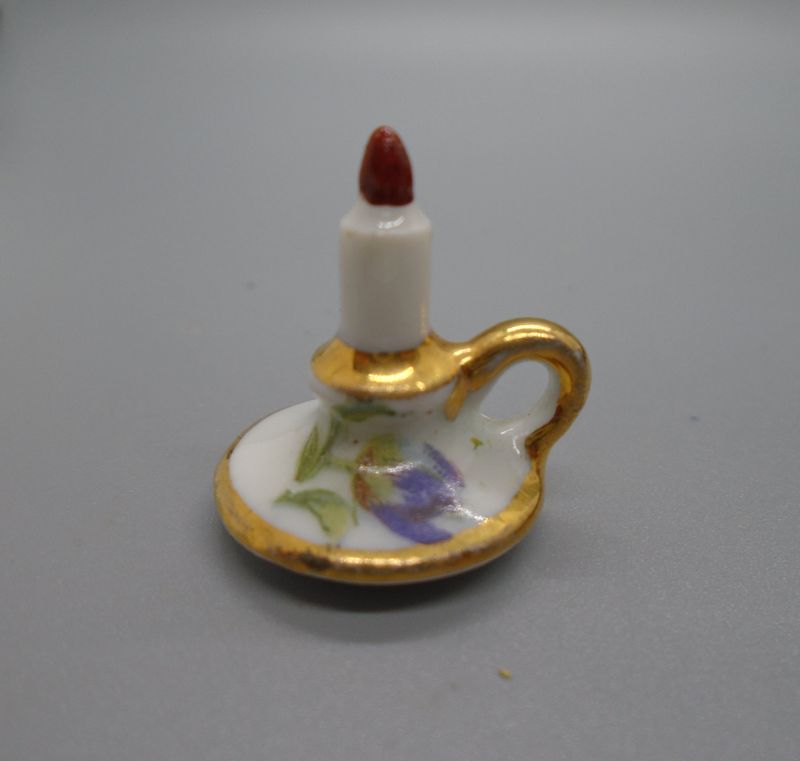 LIMOGES CANDLE STICK HOLDER AND CANDLE