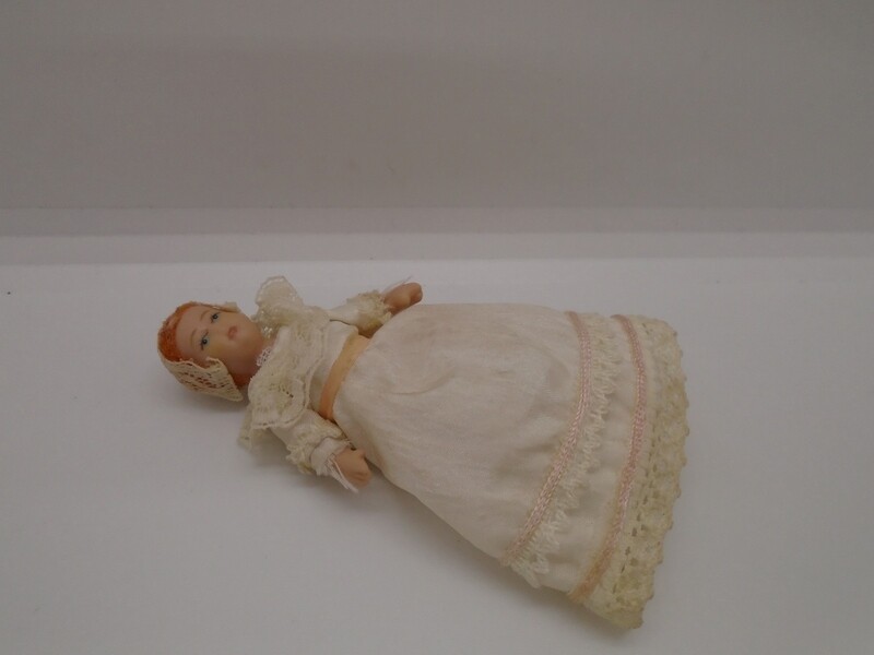 BABY IN CHRISTENING GOWN