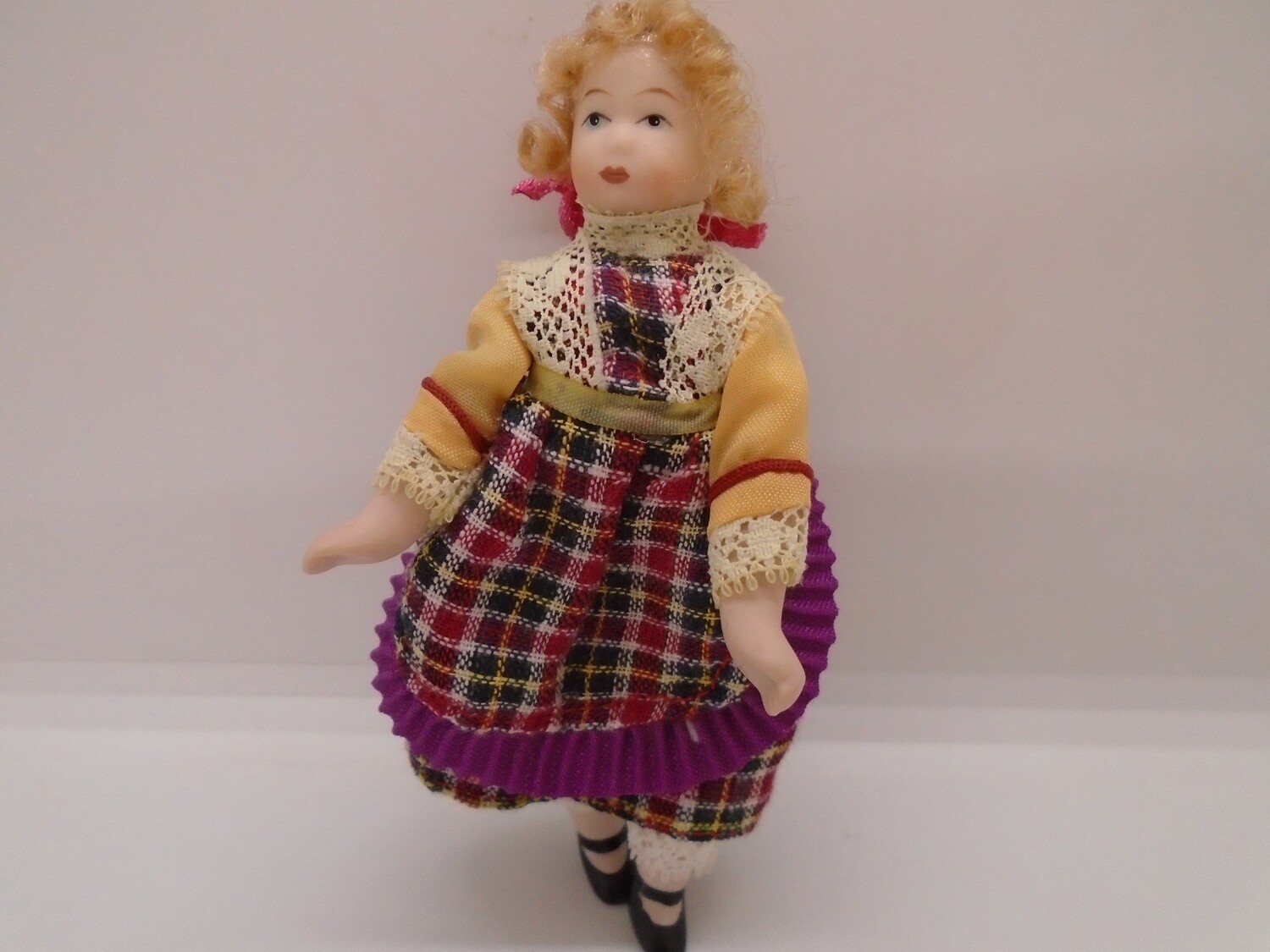 GIRL IN TARTAN DRESS