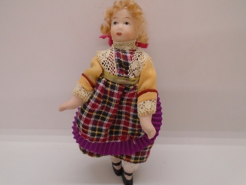 GIRL IN TARTAN DRESS