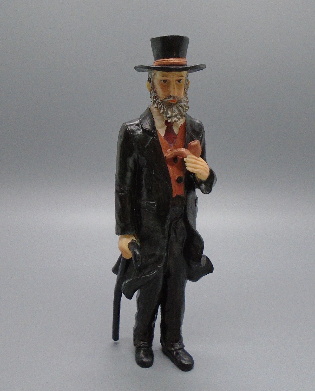 STANDING GENTLEMAN WITH CANE AND PIPE