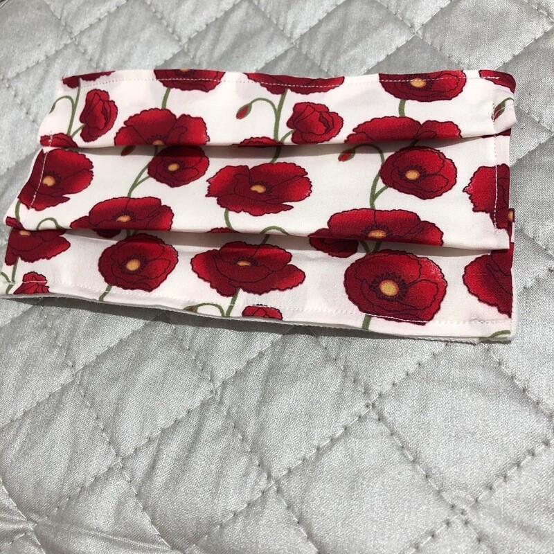 One Remembrance Day poppy mask