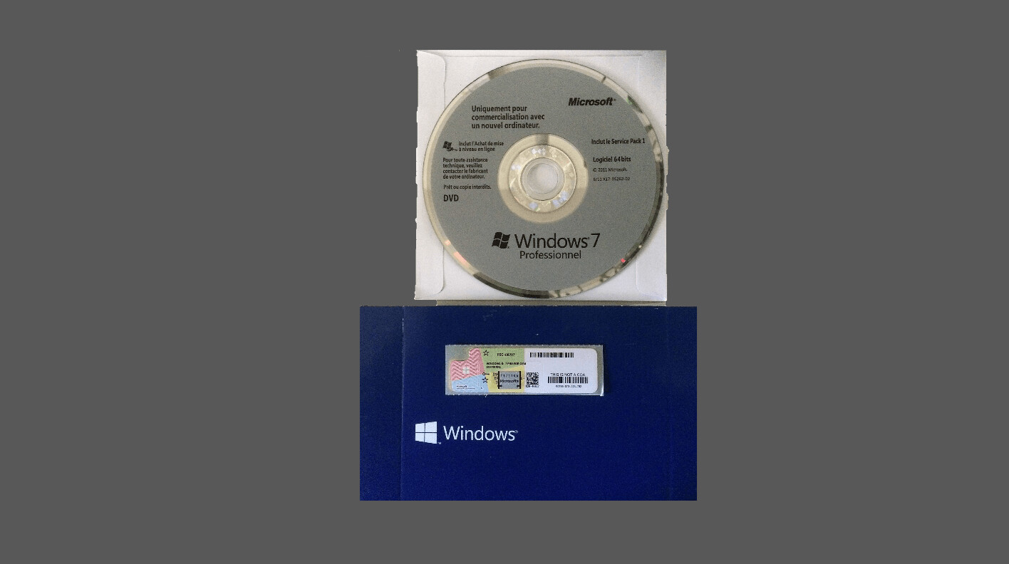 Microsoft Windows 7 Pro Sp1 format DVD langue française autocollant certificat d'authenticité.