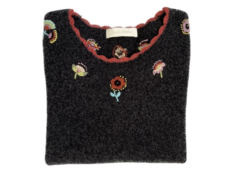 Embroidered Top with scalloped edges. Embroidered Top with scalloped edges.