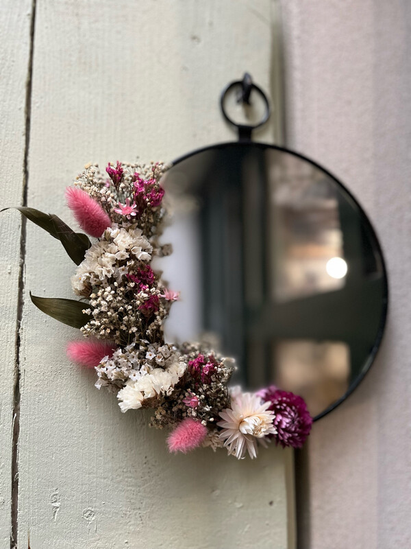 Miroir rond fleuri en laiton noir 