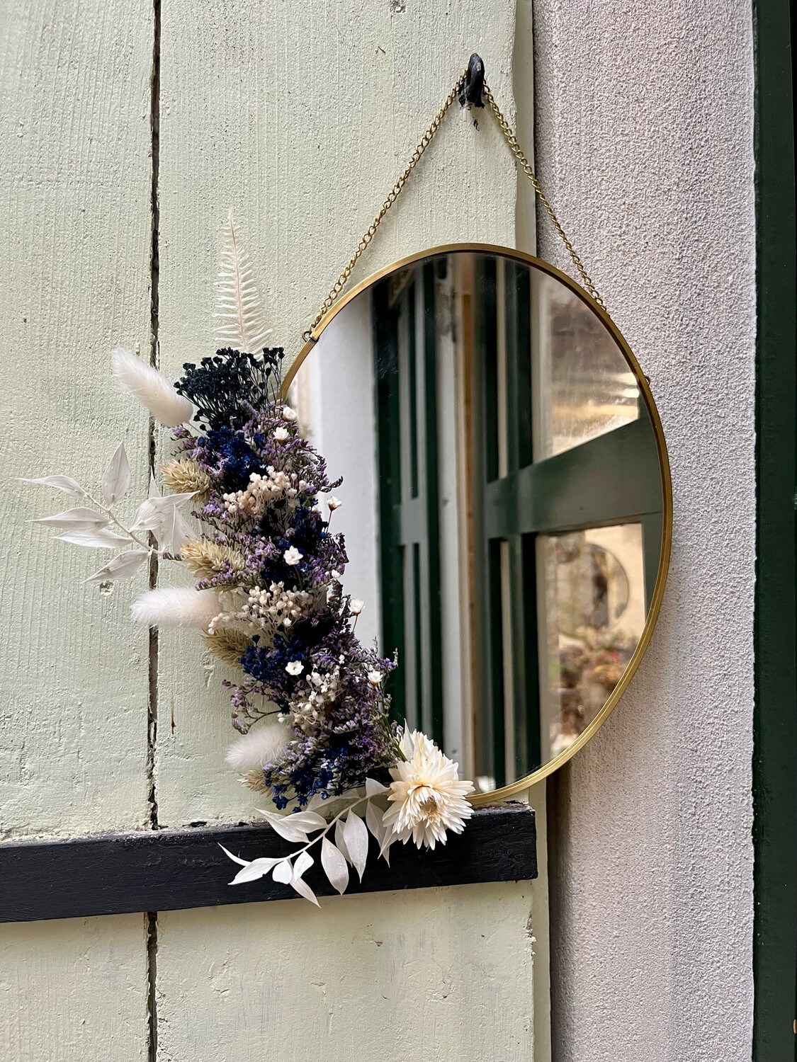 Miroir ovale fleuri en laiton Murano