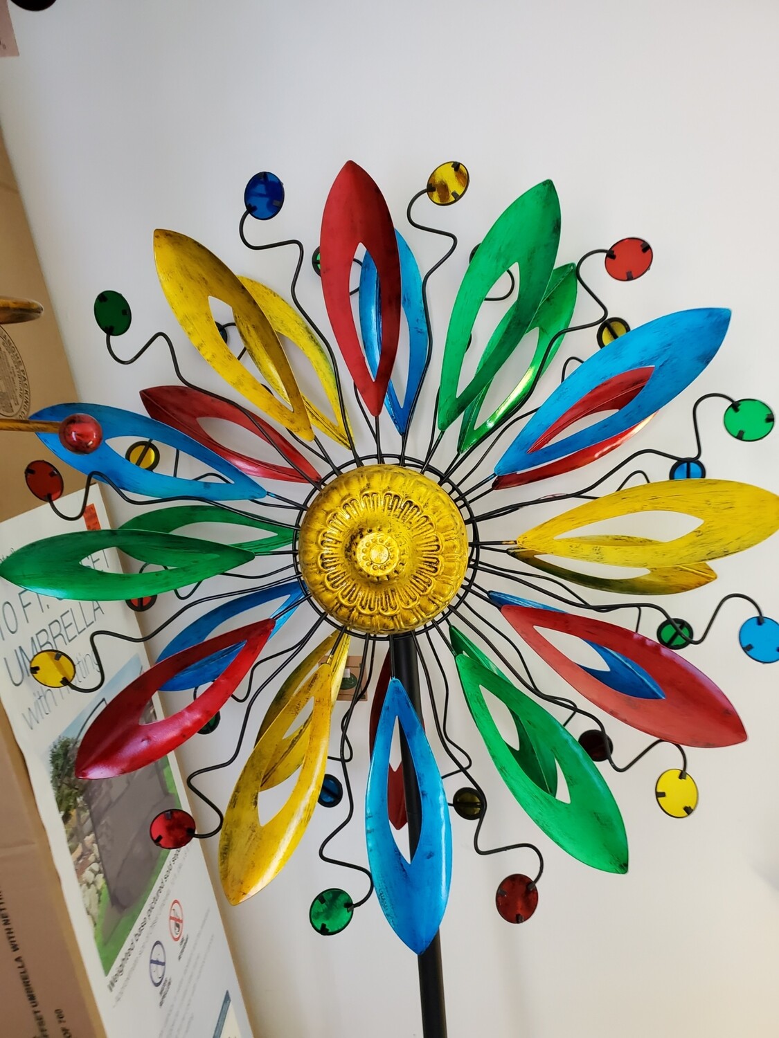 Multiple Color Feather With Holes Wind Spinner