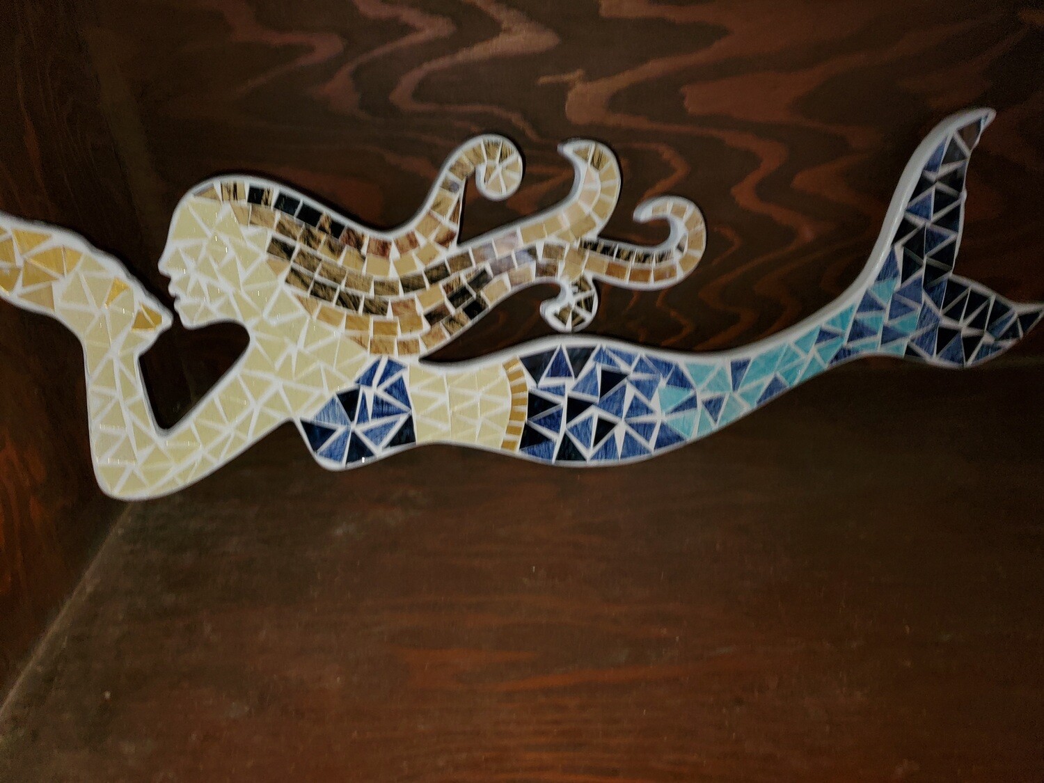 diamond  stud mermaid lays flat  or hangs