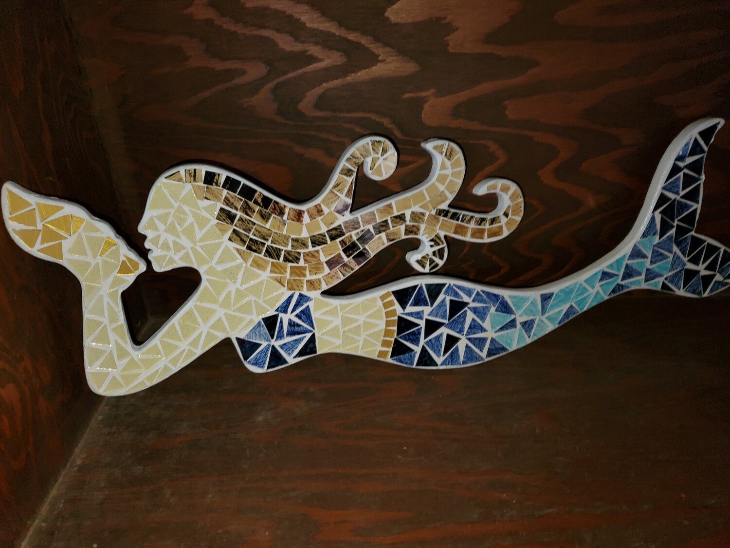 diamond  stud mermaid lays flat  or hangs